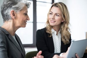 An experienced professional mentors a young law student